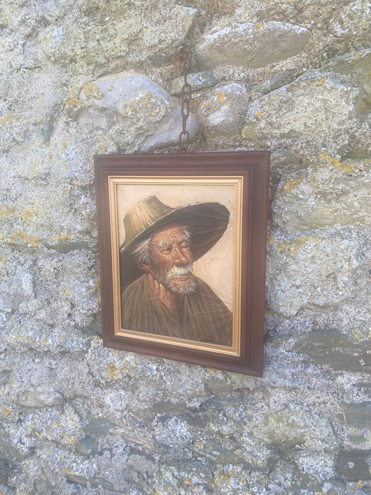 Vintage oil portrait on tabacco leaf