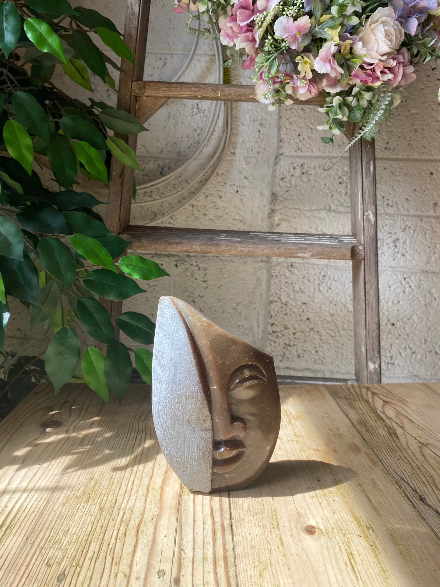 Abstract face Shona stone sculpture