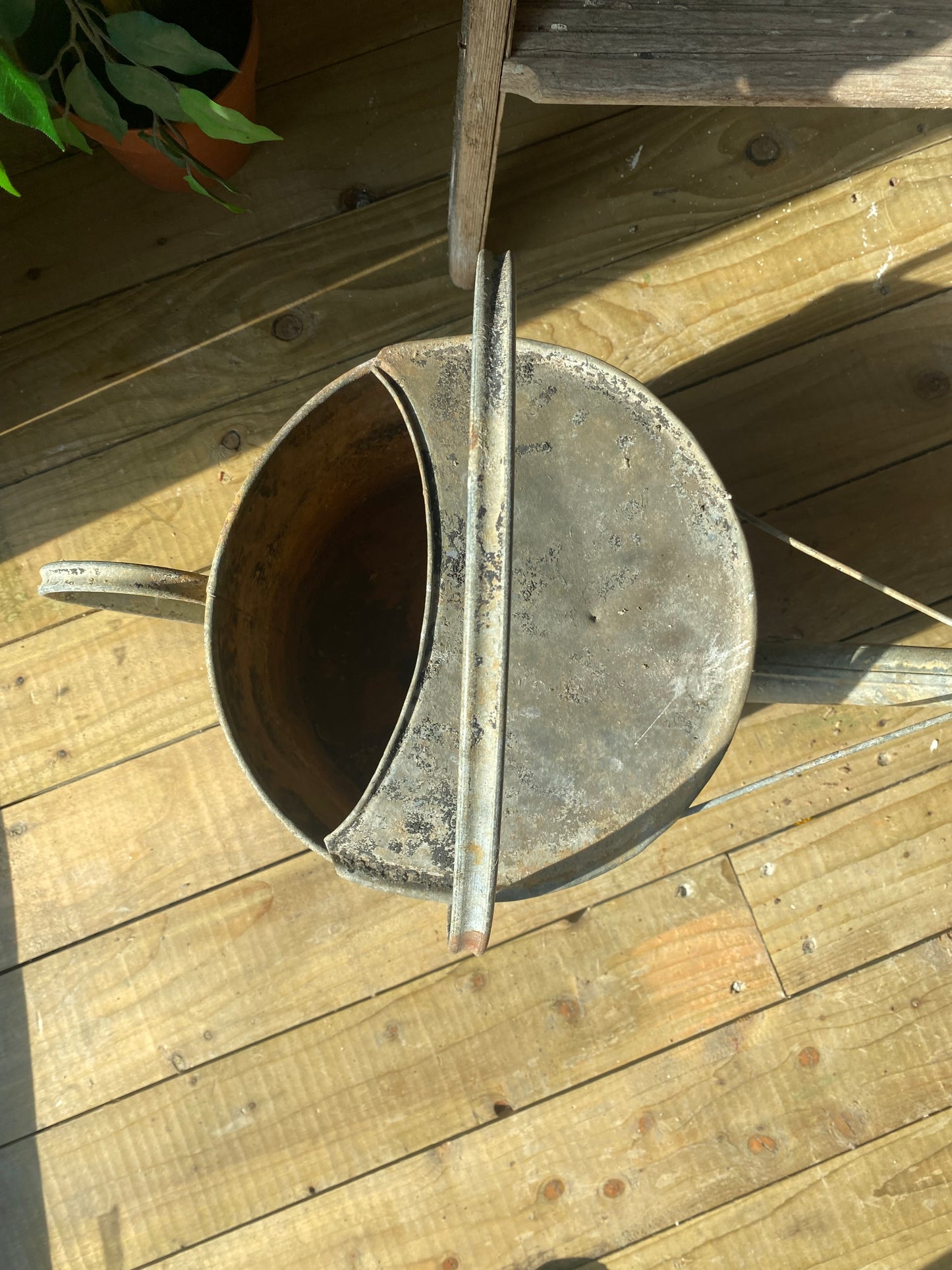 Vintage galvanised watering can