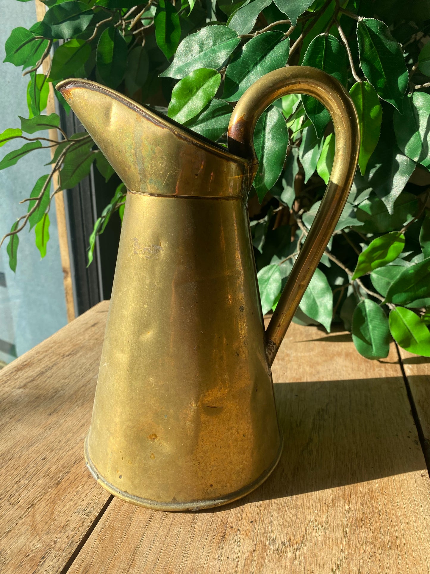 Antique brass pitcher