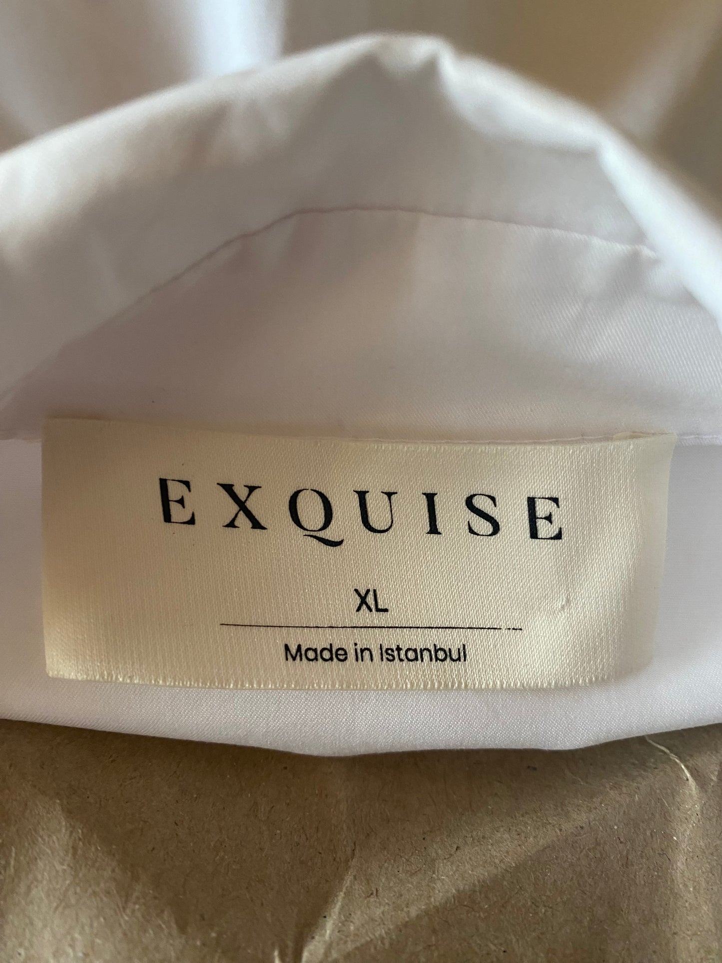 Exquise Designer embellished white dress